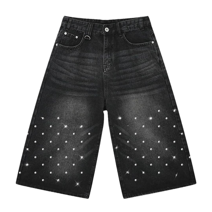 Black denim jorts with Rhinestone detailing on the front and embroidered artwork at the back pockets 