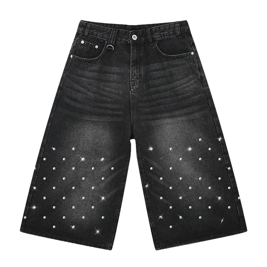 Black denim jorts with Rhinestone detailing on the front and embroidered artwork at the back pockets 