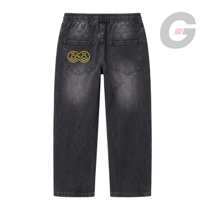 Washed denim pant with elastic waistband, and 'He Goes All Around' embroidered Patch. Faith driven streetwear by God On Every Side. 