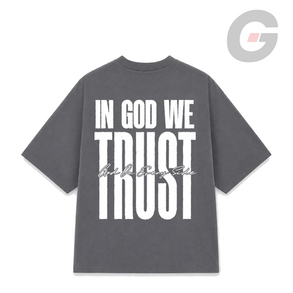 Gray Oversized t-shirt with a white bold 'IN GOD WE TRUST' graphic on the back by God on Every Side