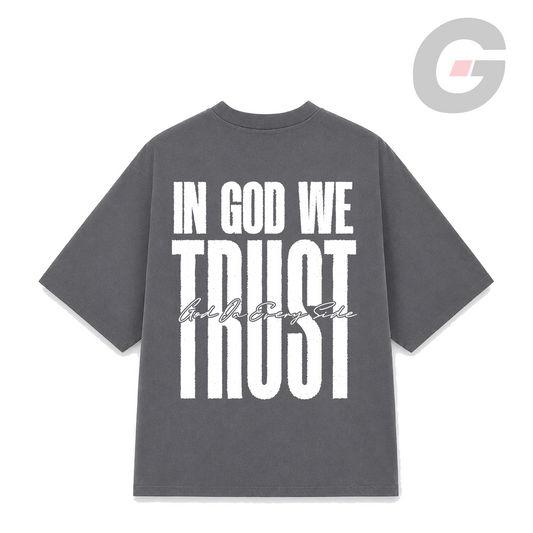 Gray Oversized t-shirt with a white bold 'IN GOD WE TRUST' graphic on the back by God on Every Side